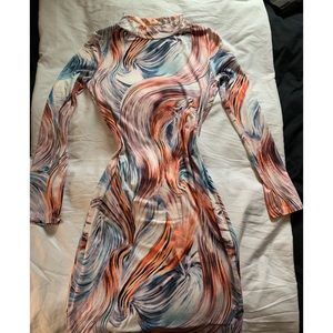 Long sleeve multicolored mini dress.